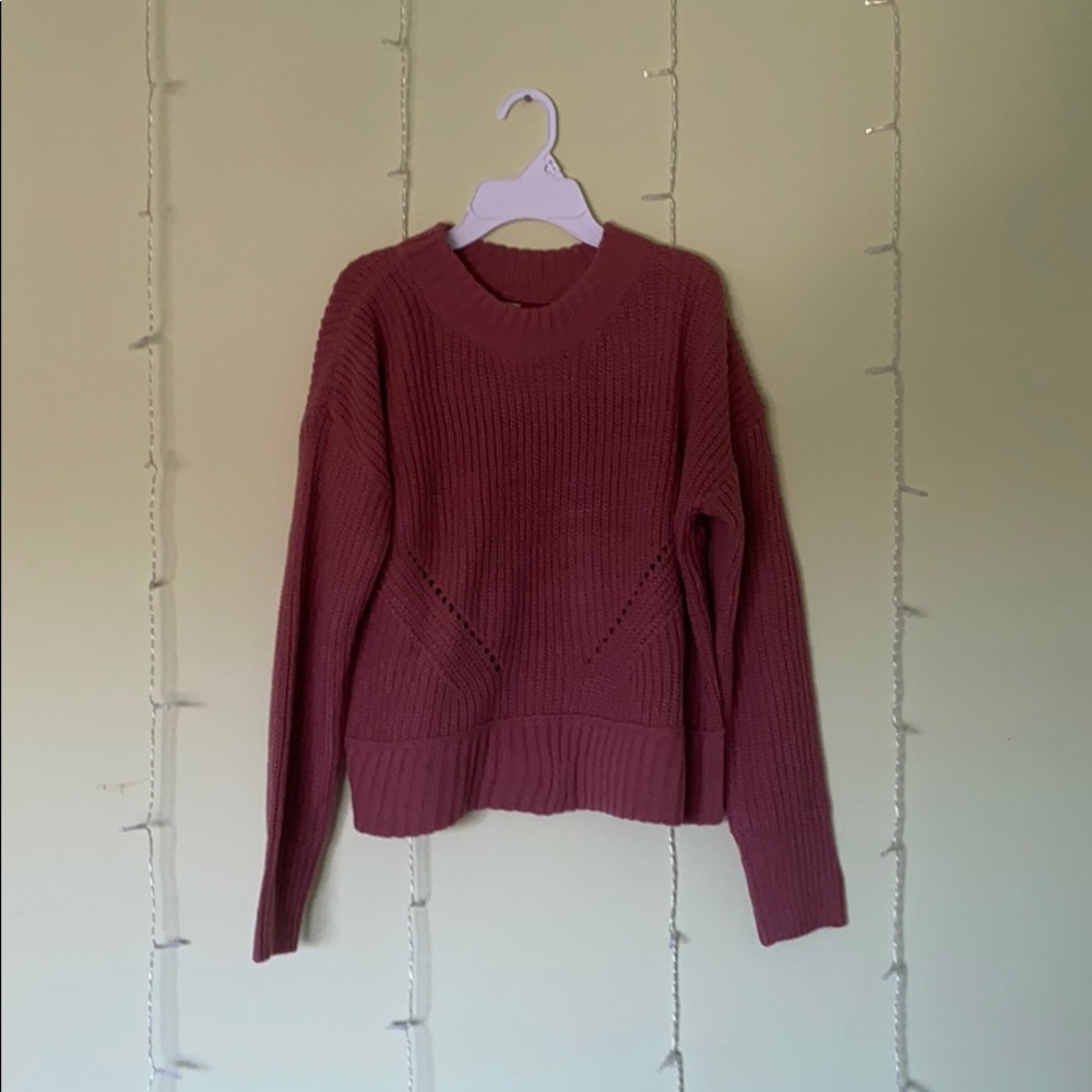 Dark magenta knitted sweater with hole design